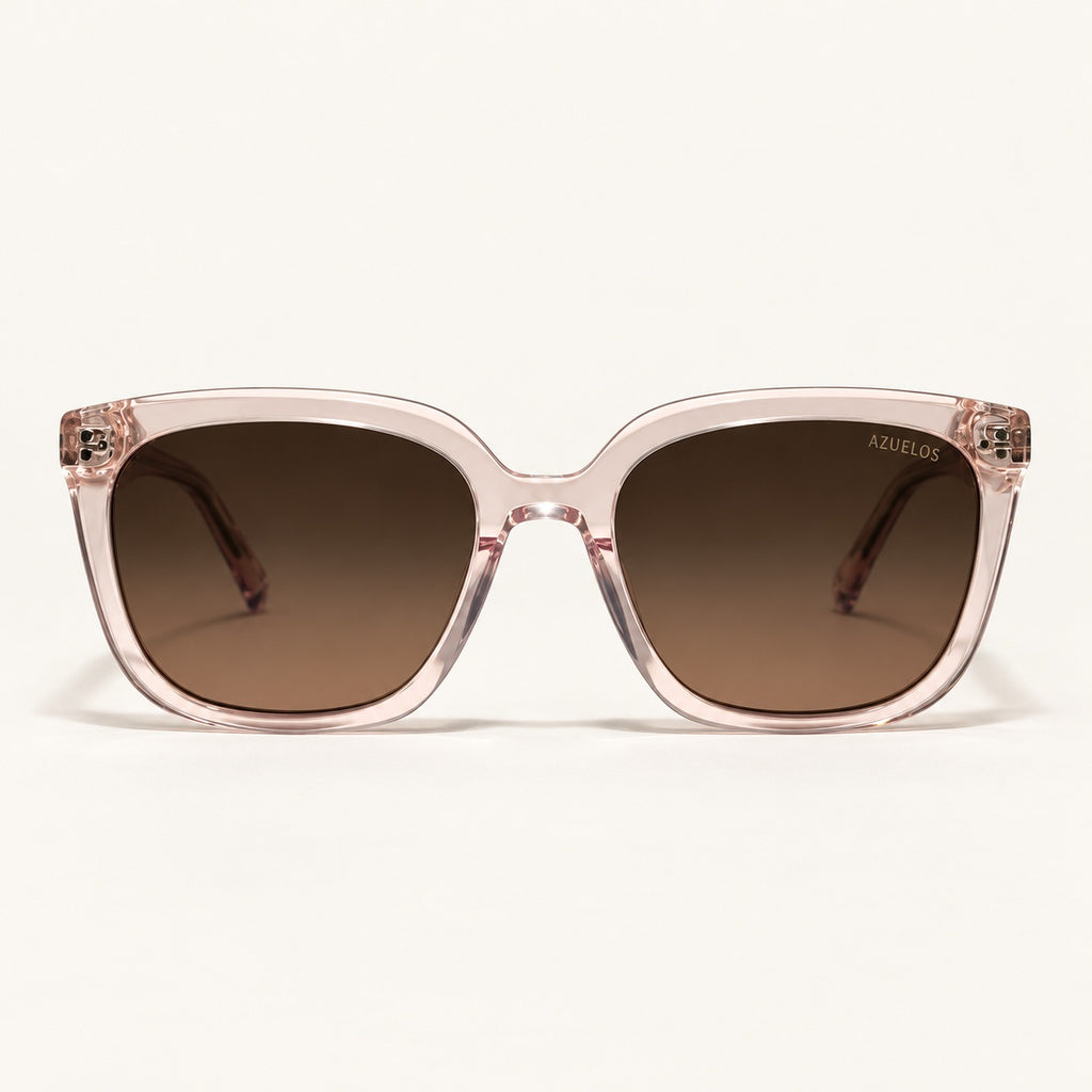 Lunettes de soleil femme AZUELOS Avery C2, monture rose translucide, vue de face.