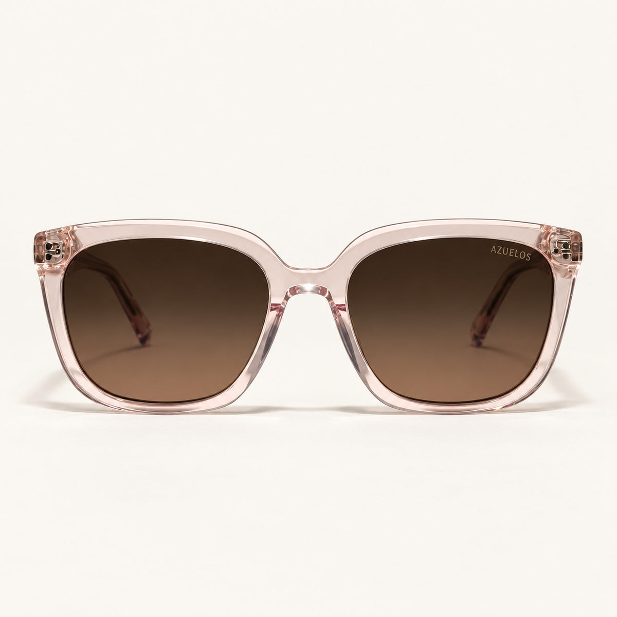 Lunettes de soleil femme AZUELOS Avery C2, monture rose translucide, vue de face.