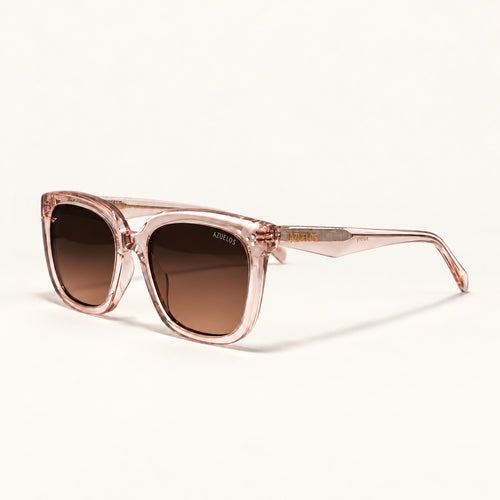AZUELOS Avery C2 de trois quarts, monture cerclée rose translucide et verres bruns dégradés.