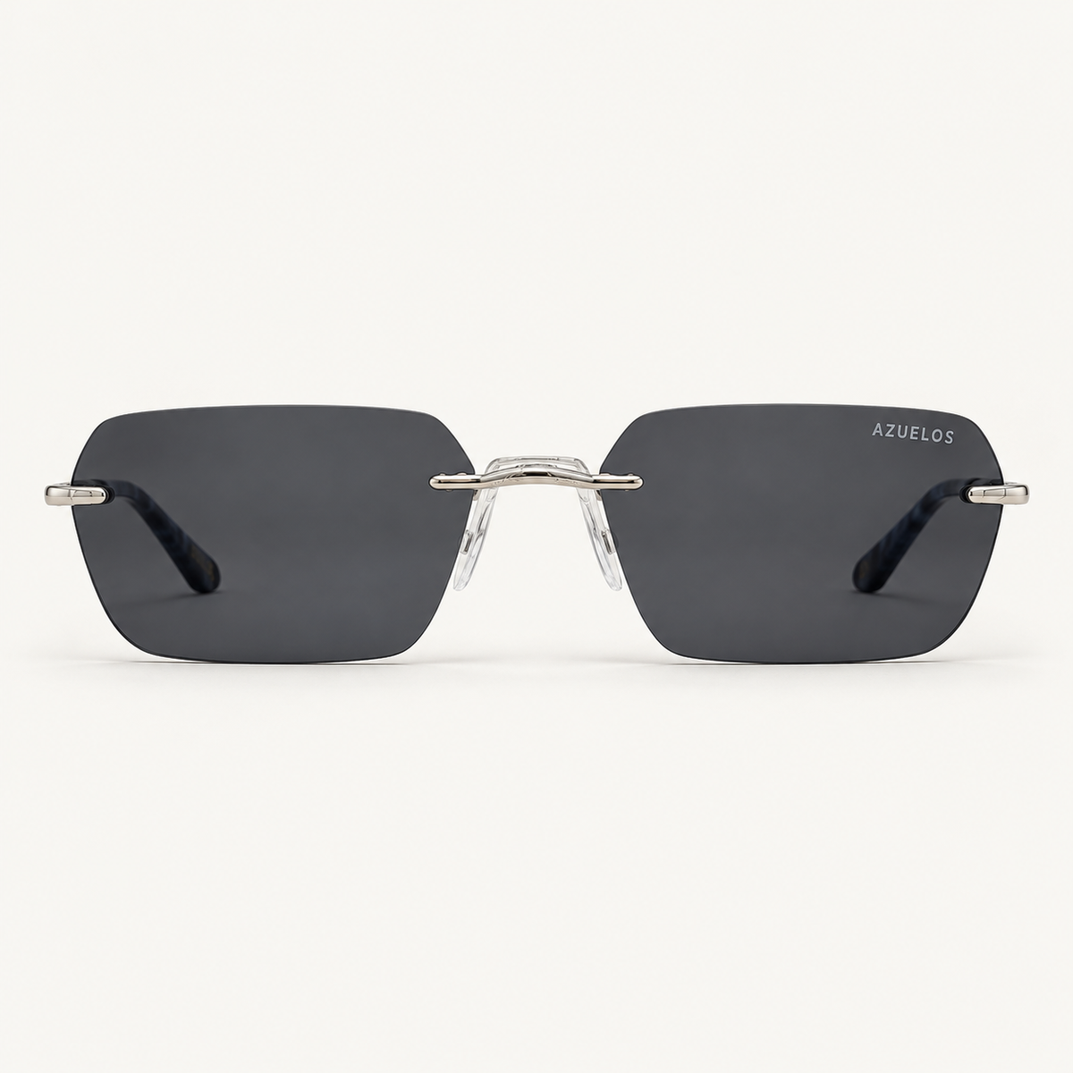 Lunettes de soleil percées Coda C1 Azuelos, verres foncés et détails argentés, vue de face