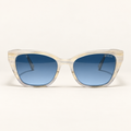 VAUGHN C3, lunettes de soleil femme en acétate ivoire nacré translucide, monture œil-de-chat et verres bleus dégradés, vue de face